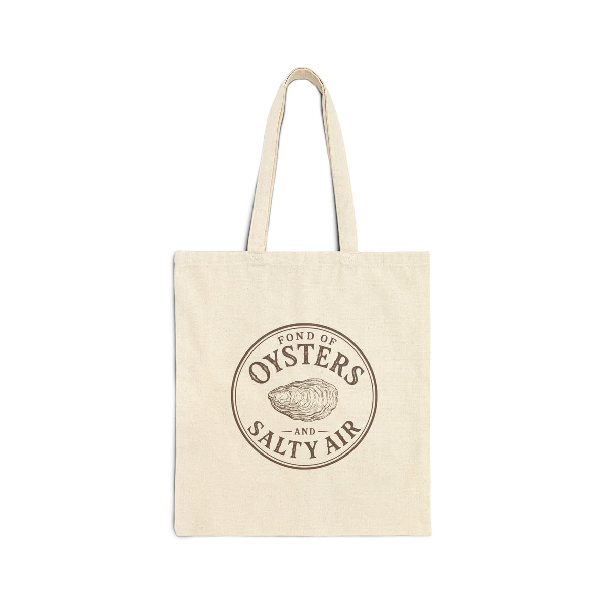 A natural canvas tote bag with two shoulder straps, featuring a circular brown graphic print on the front that reads 'FOND OF OYSTERS AND SALTY AIR' around an oyster illustration, shown against a plain white background.