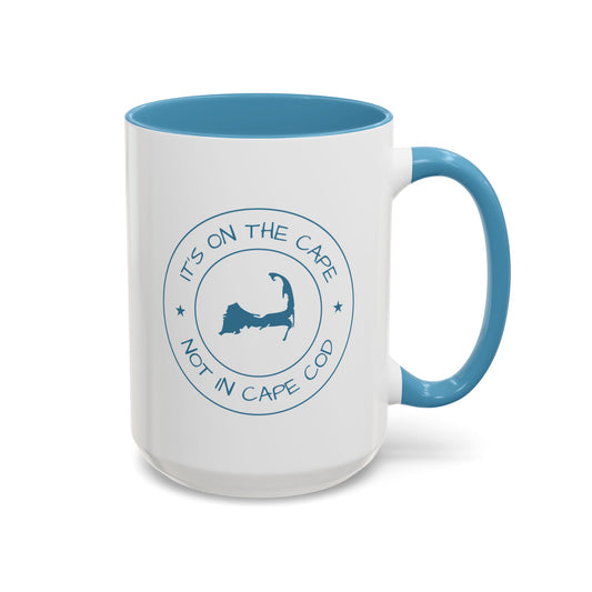 White mug with blue interior and handle, featuring a funny graphic and text on a white background
