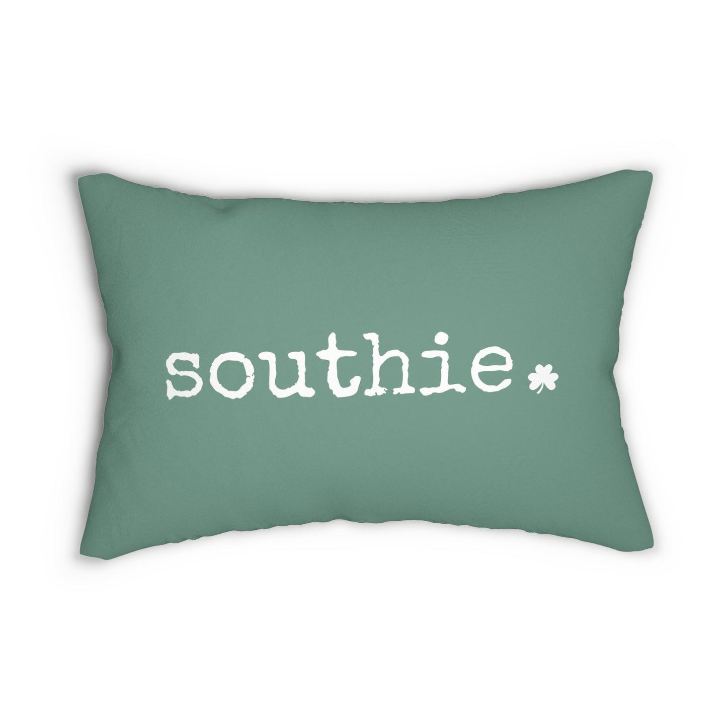 Green pillow with 'southie' text on a white background with a small white shamrock